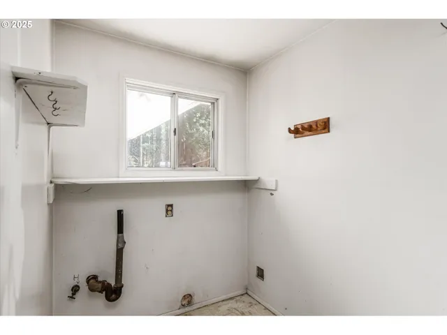 a workspace with furniture and a flat screen tv