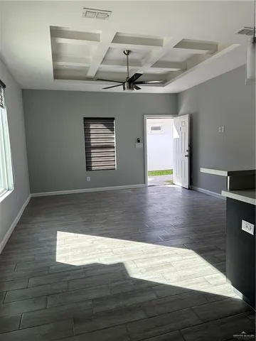 a kitchen with stainless steel appliances granite countertop a sink and a stove