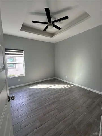 a bathroom with a sink toilet and mirror
