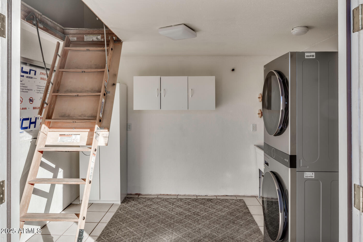 17200 West Bell Road, Unit 1500 Surprise, AZ 85374 - Photo 6 of 9 a view of walk in closet with clothes and shoes