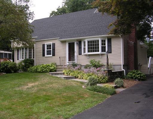 304 Davis Road Fairfield, CT 06825 - Photo 1 of 1 a front view of a house with garden