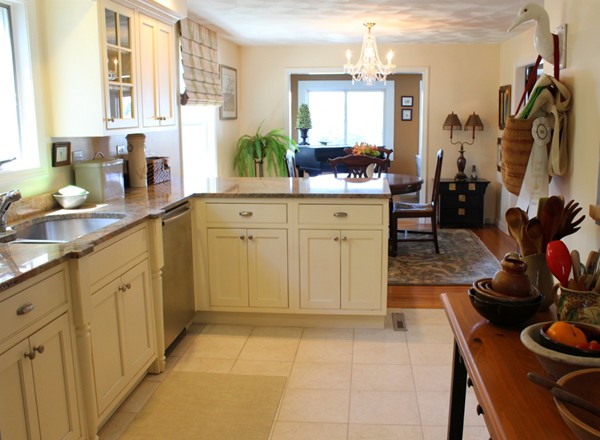 68 Beach Street Warren, RI 02885 - Photo 15 of 25 a kitchen with a sink and cabinets