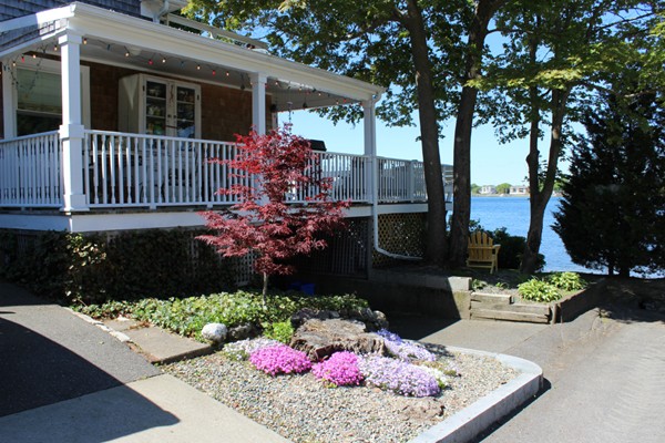 68 Beach Street Warren, RI 02885 - Photo 3 of 25 a front view of a house having yard