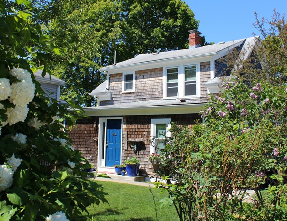 68 Beach Street Warren, RI 02885 - Photo 8 of 25 a front view of a house with a porch