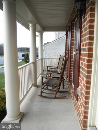 5622 New Forge Road White Marsh, MD 21162 - Photo 20 of 29 a view of a balcony with chairs