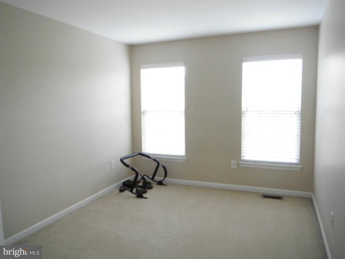 5622 New Forge Road White Marsh, MD 21162 - Photo 3 of 29 an empty room with a window