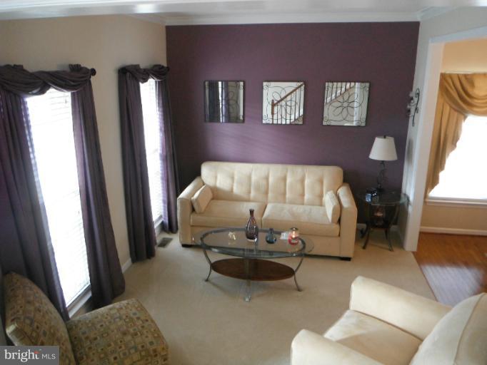 5622 New Forge Road White Marsh, MD 21162 - Photo 9 of 29 a living room with furniture and a rug