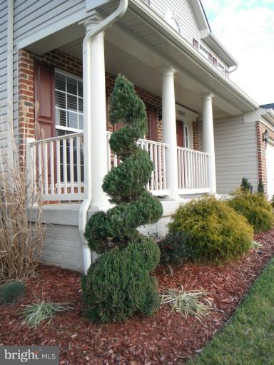 5622 New Forge Road White Marsh, MD 21162 - Photo 10 of 29 a view of a house with a yard and plants