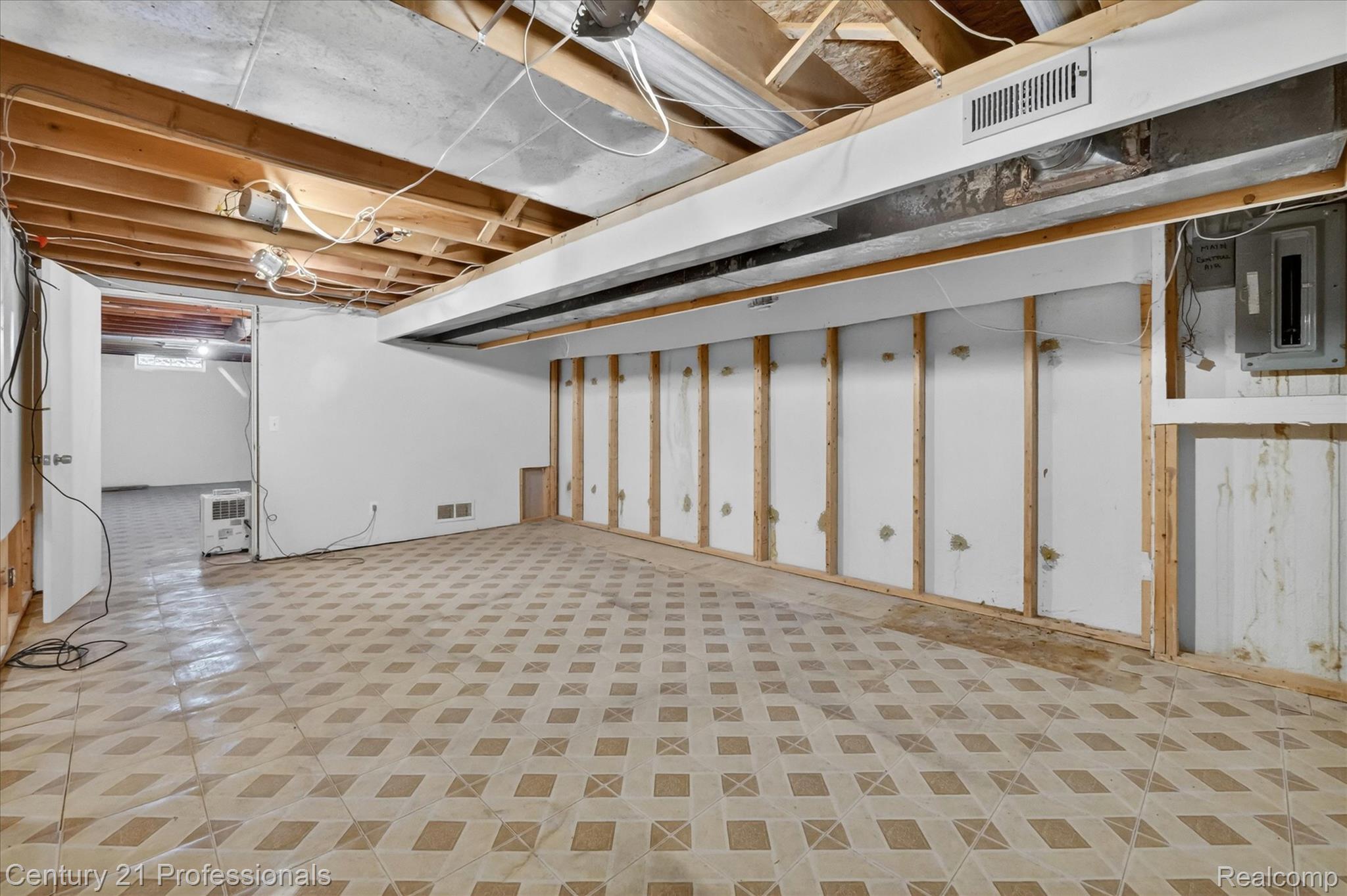 134 Foxboro Drive Rochester, MI 48309 - Photo 32 of 39 Unfinished basement featuring light flooring and electric panel