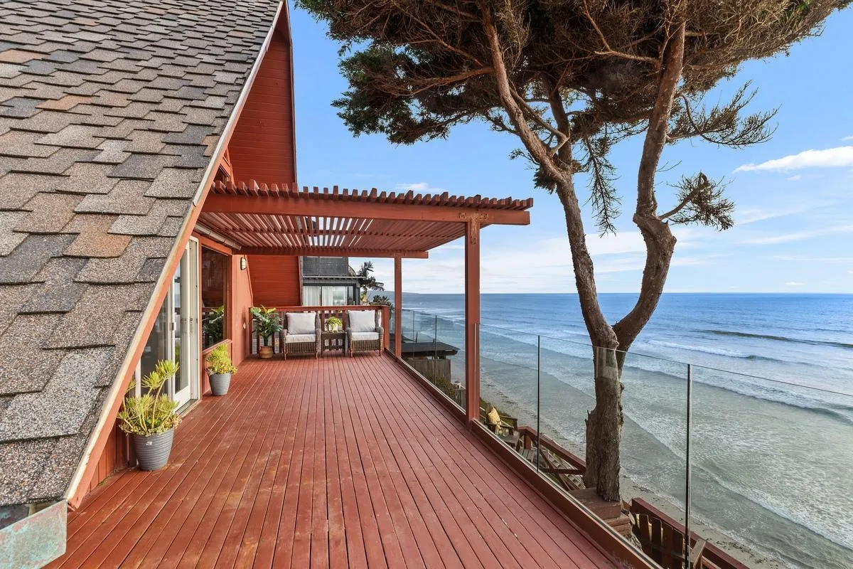 1366 Neptune Avenue Encinitas, CA 92024 - Photo 1 of 48 an outdoor sitting area with view of tree