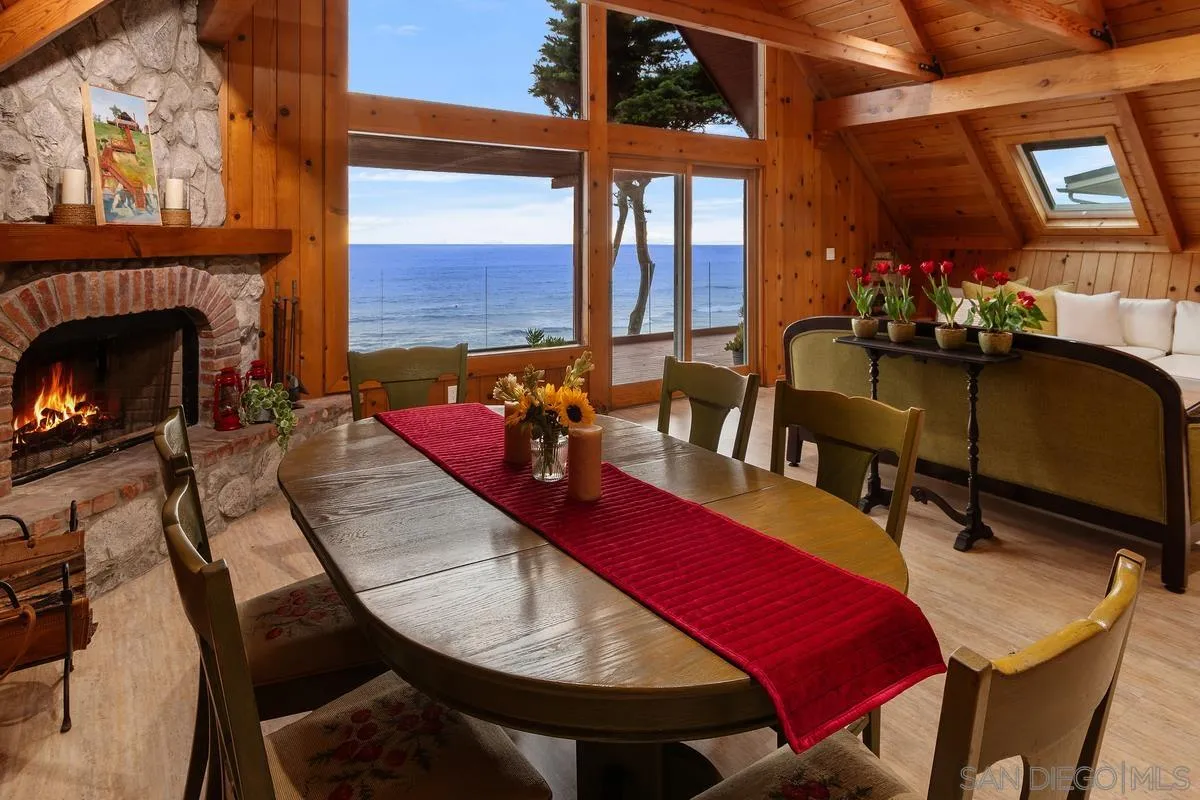 1366 Neptune Avenue Encinitas, CA 92024 - Photo 12 of 48 a view of a dining room with furniture window and outside view