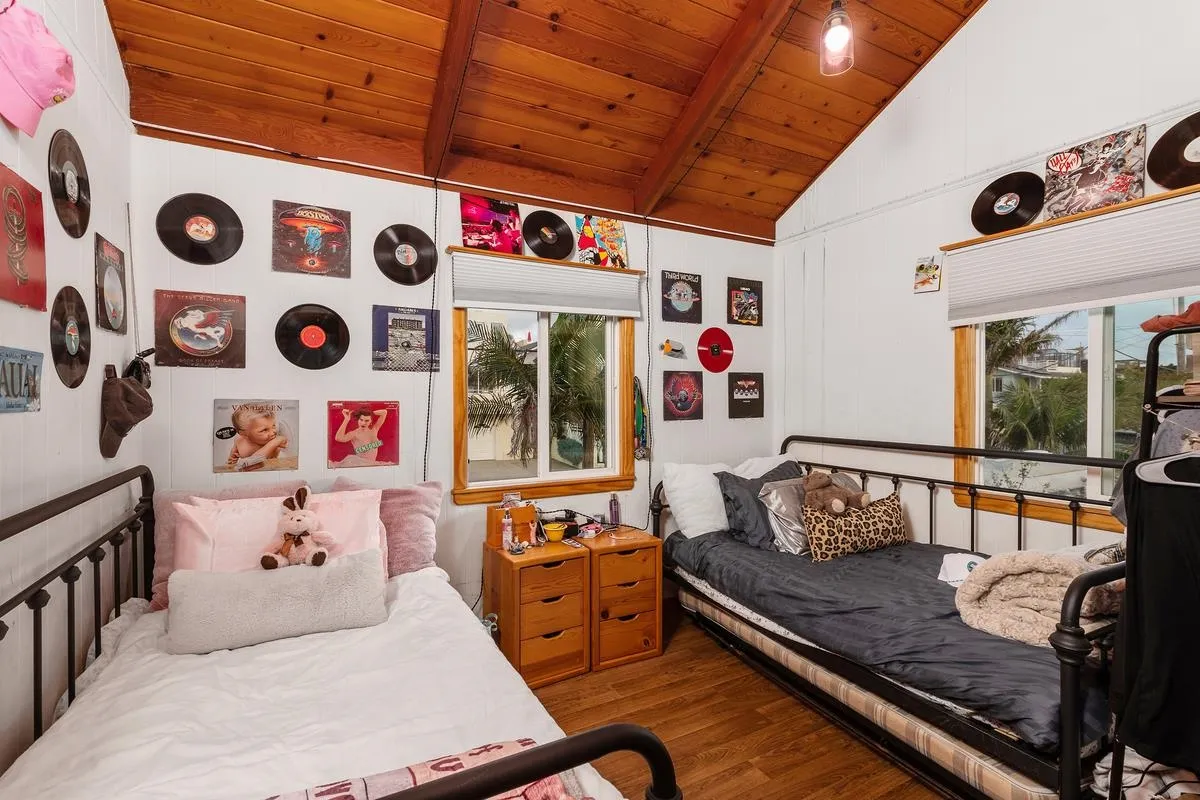 1366 Neptune Avenue Encinitas, CA 92024 - Photo 34 of 48 a bedroom with furniture and a window