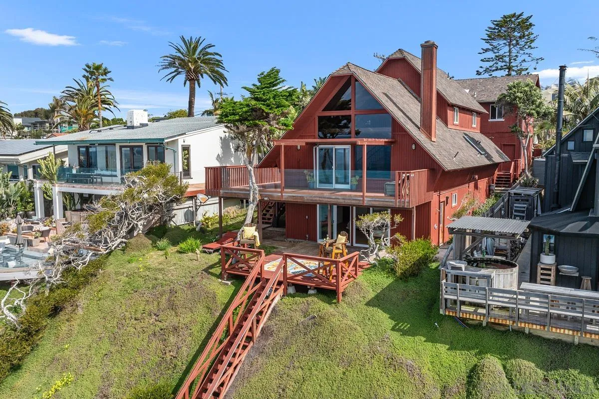 1366 Neptune Avenue Encinitas, CA 92024 - Photo 45 of 48 a view of a house with pool and chairs