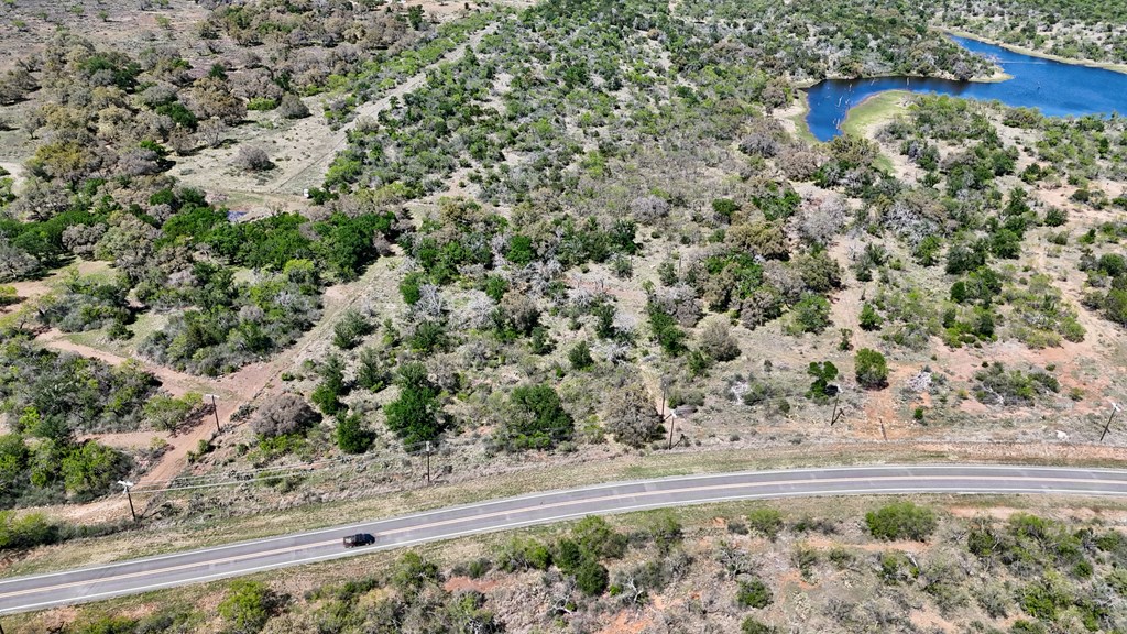 1 Ranch Road 2233 Kingsland, TX 78639 - Photo 21 of 36 a view of a yard with wooden fence