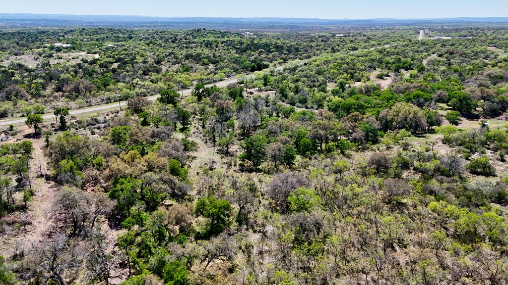 1 Ranch Road 2233 Kingsland, TX 78639 - Photo 32 of 36 an aerial view of a houses with a yard and mountain view