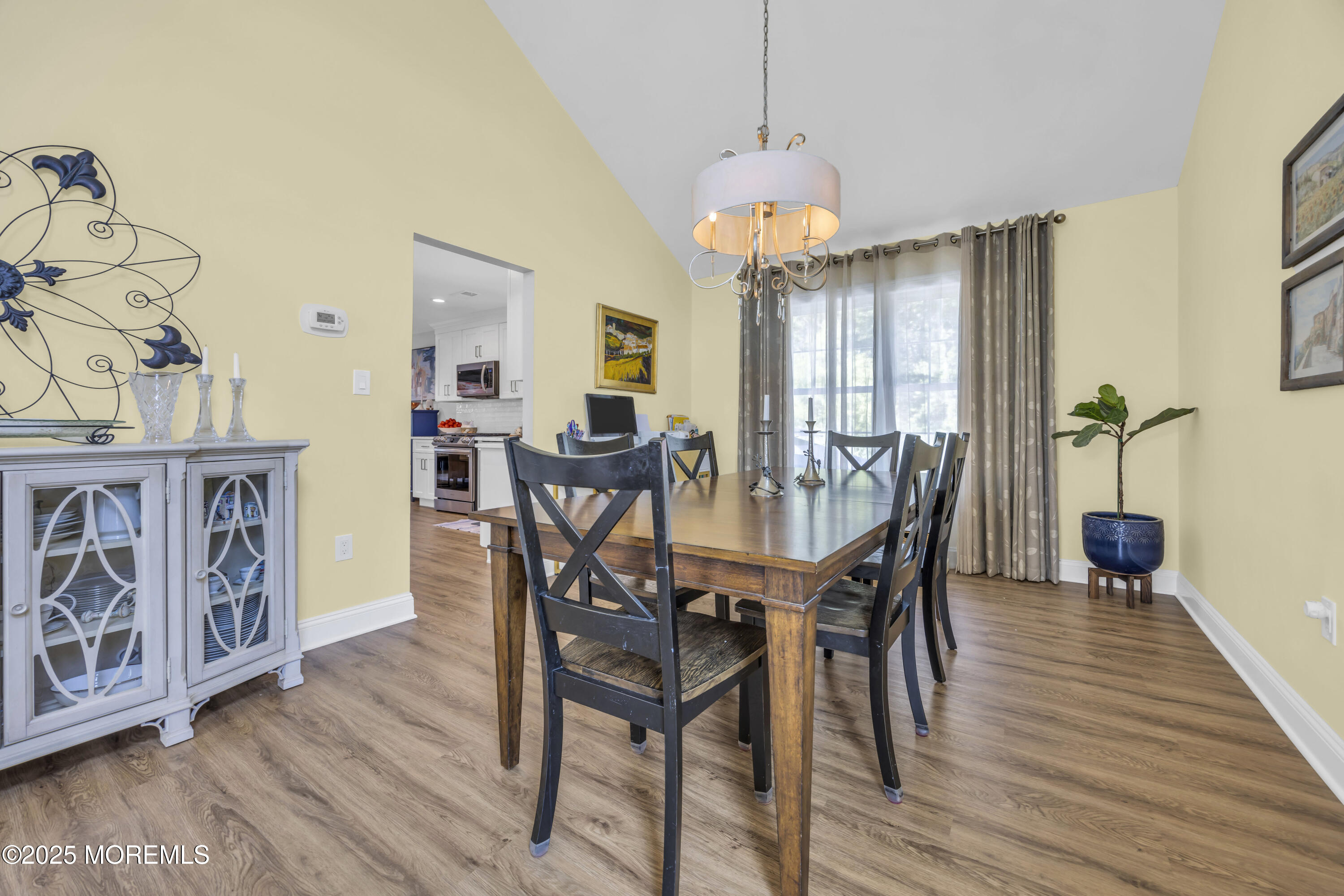 50 Diamond Lane Howell, NJ 07731 - Photo 15 of 49 a view of a dining room with furniture window and wooden floor