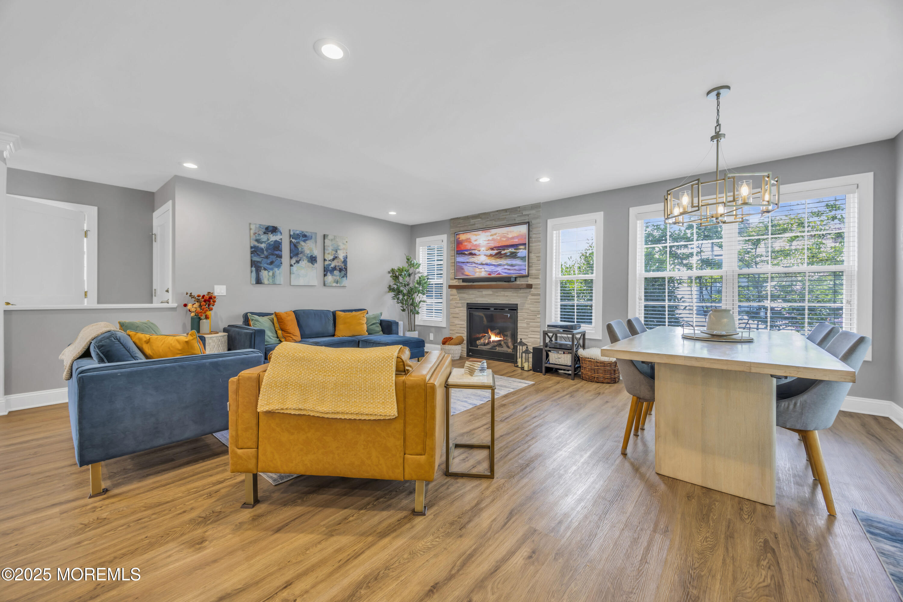 50 Diamond Lane Howell, NJ 07731 - Photo 23 of 49 a living room with furniture fireplace and a large window