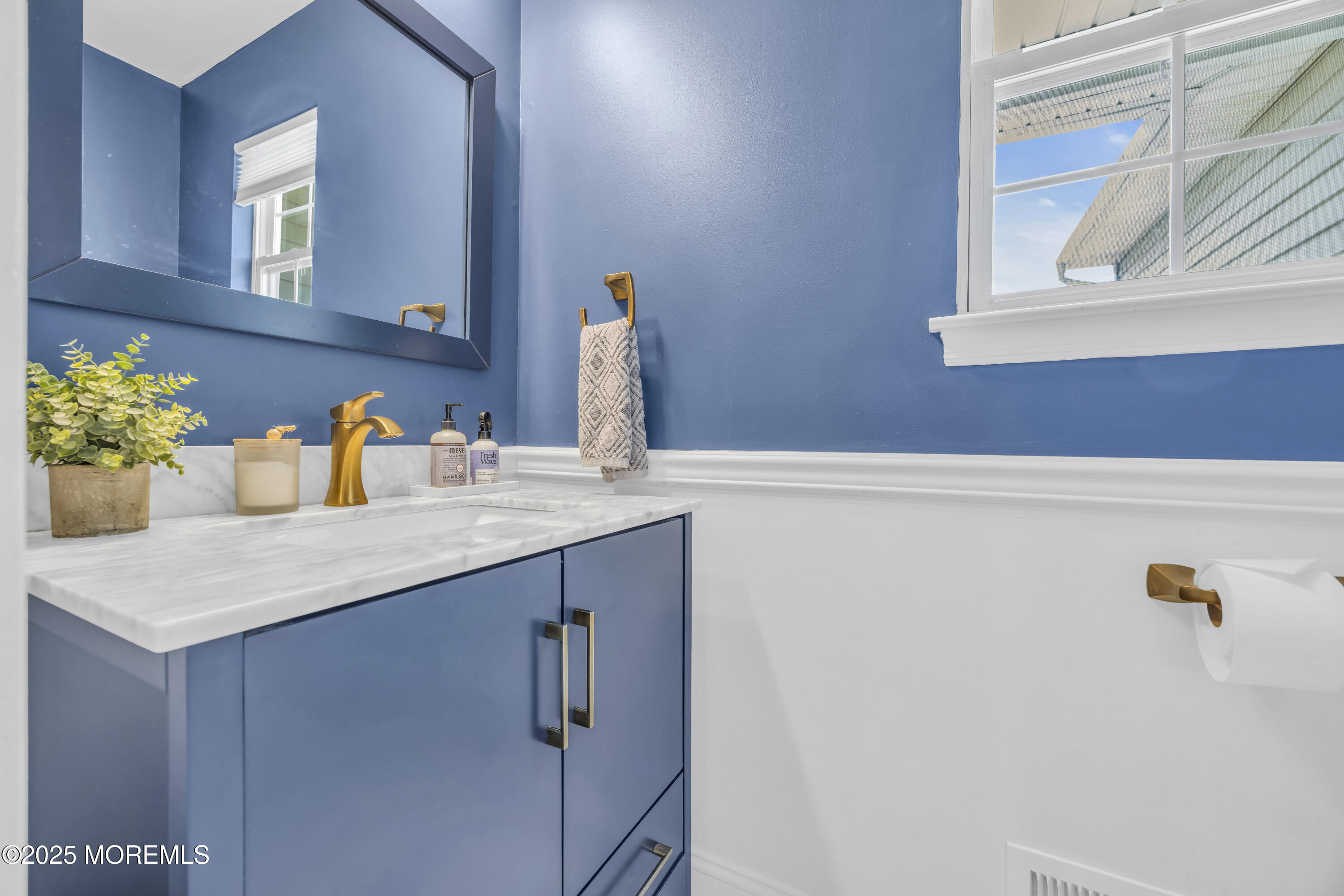 50 Diamond Lane Howell, NJ 07731 - Photo 28 of 49 a bathroom with a sink and a mirror