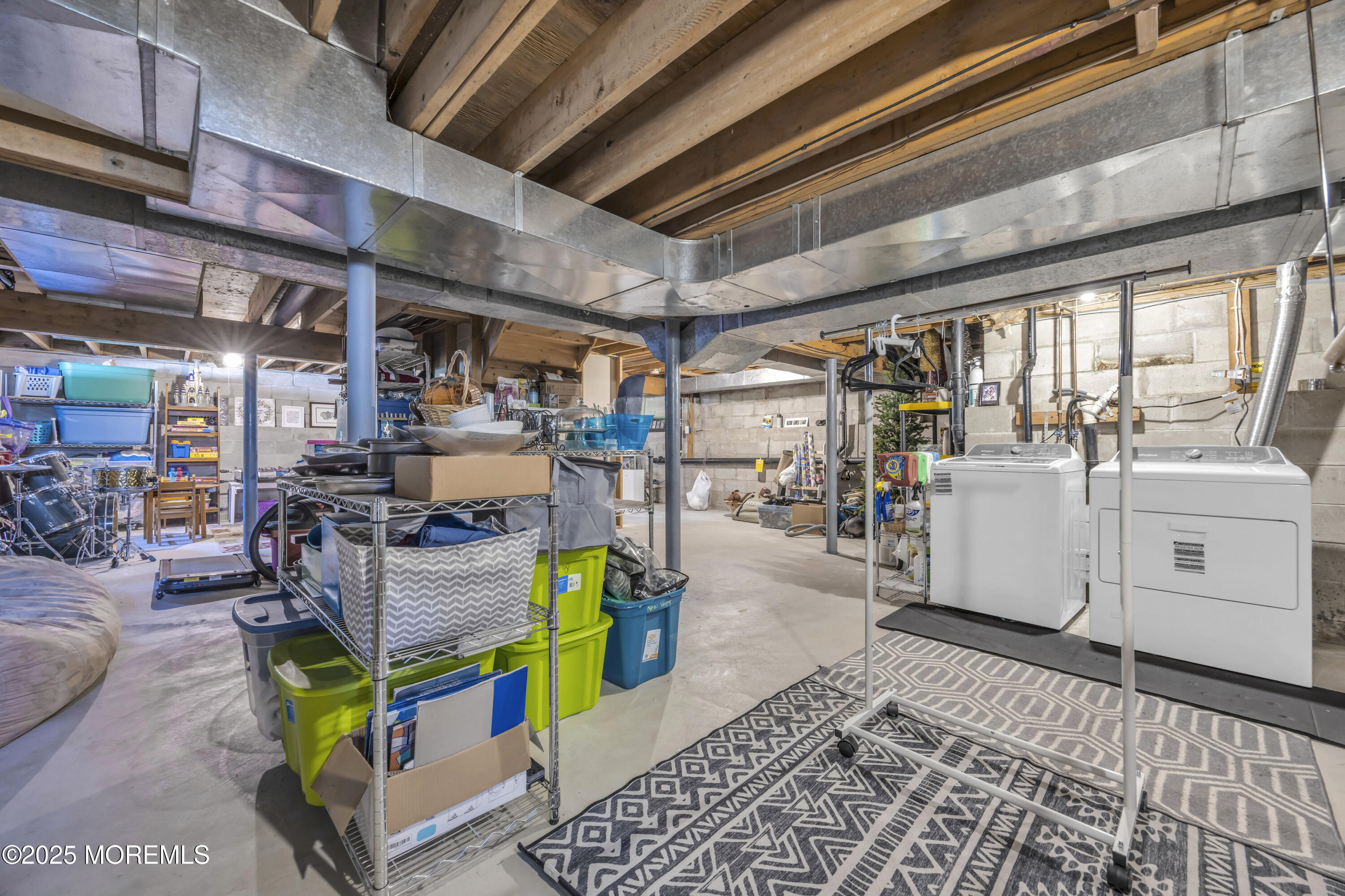 50 Diamond Lane Howell, NJ 07731 - Photo 30 of 49 a utility room with lots of wooden furniture