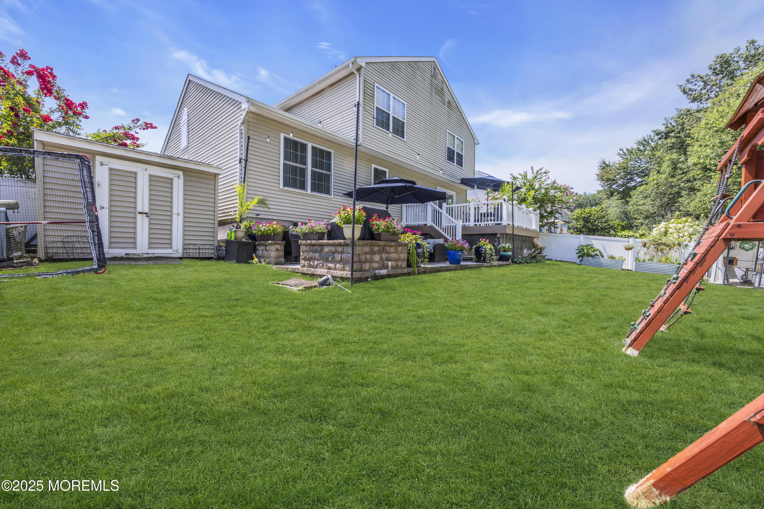 50 Diamond Lane Howell, NJ 07731 - Photo 40 of 49 a view of a house with a yard and sitting area