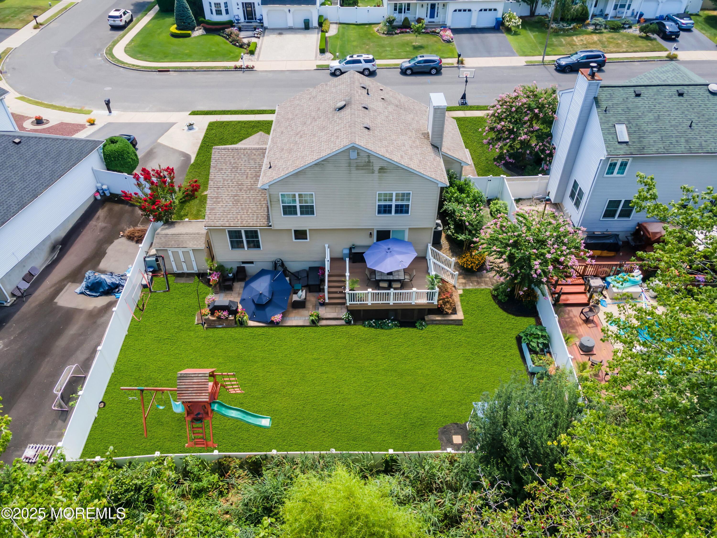 50 Diamond Lane Howell, NJ 07731 - Photo 43 of 49 an aerial view of a house with a garden and swimming pool
