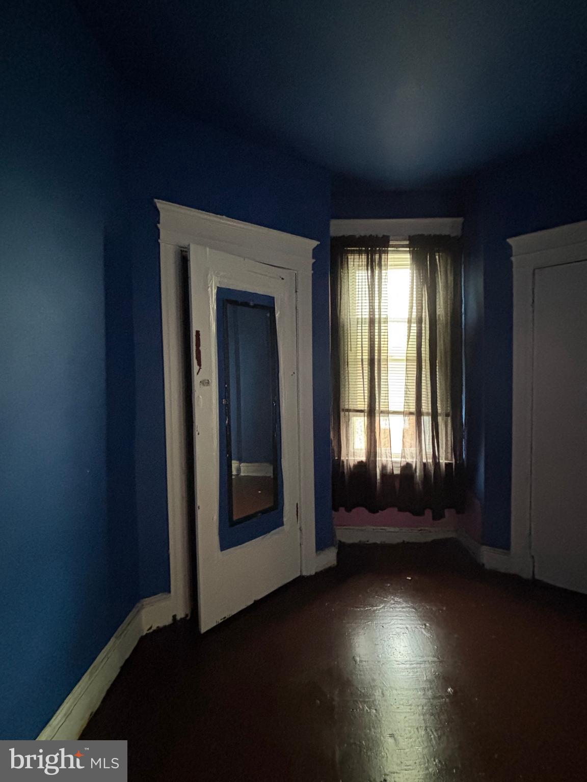 3017 North 26th Street Philadelphia, PA 19132 - Photo 17 of 26 an empty room with windows