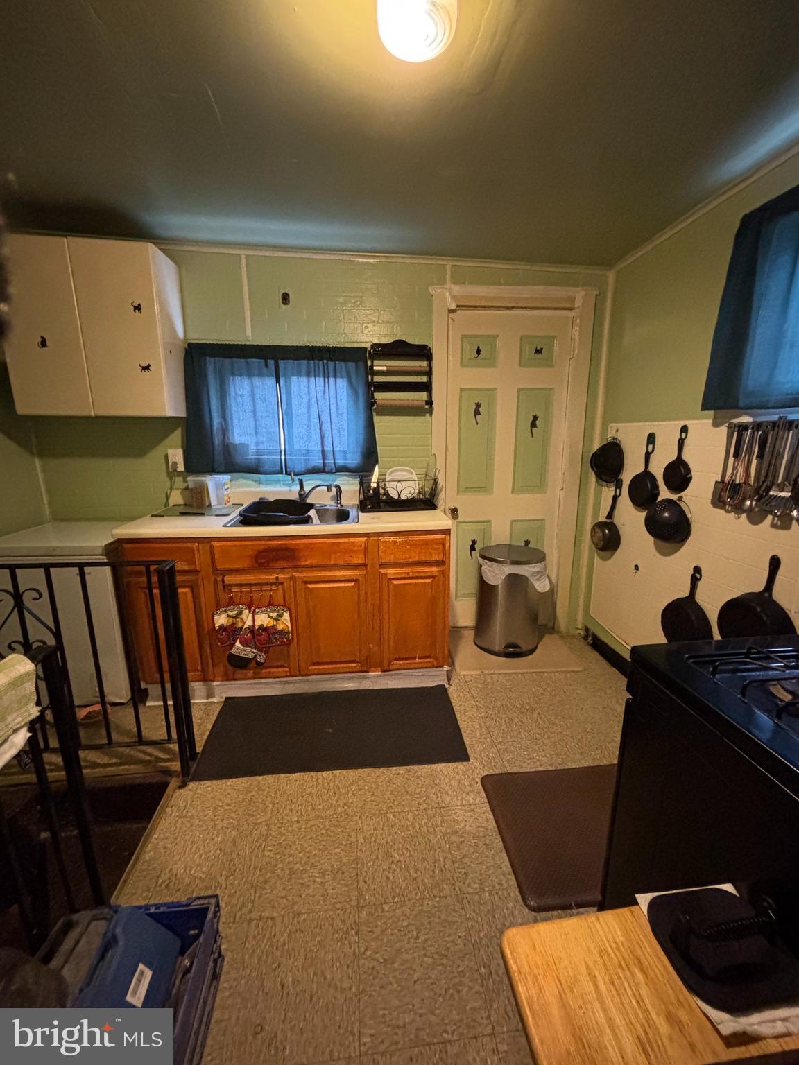3017 North 26th Street Philadelphia, PA 19132 - Photo 20 of 26 a living room with furniture and a window
