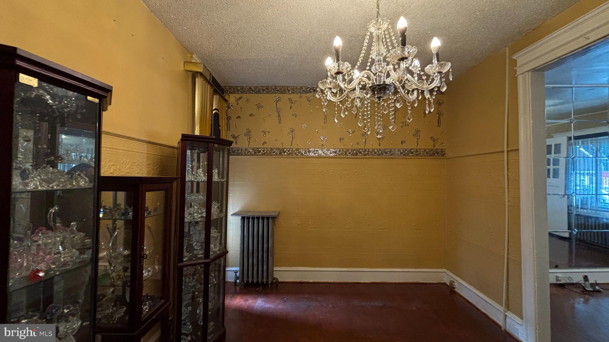 3017 North 26th Street Philadelphia, PA 19132 - Photo 6 of 26 a view of a hallway with chandelier and entryway