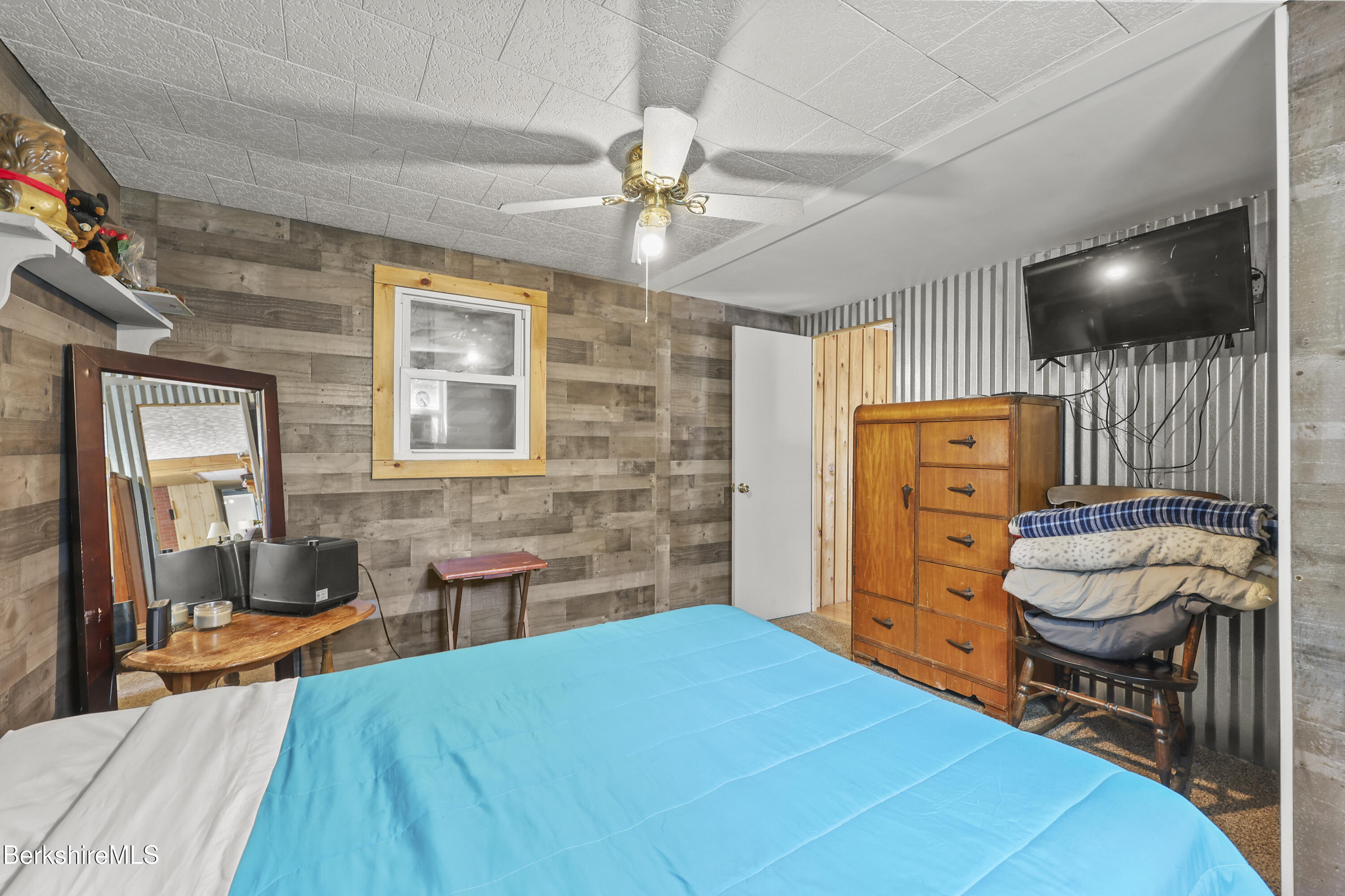 192 Curran Road Cheshire, MA 01225 - Photo 24 of 50 a bedroom with a bed and wooden floor