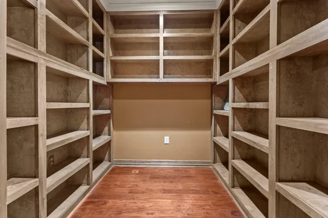 a view of an empty walk in closet