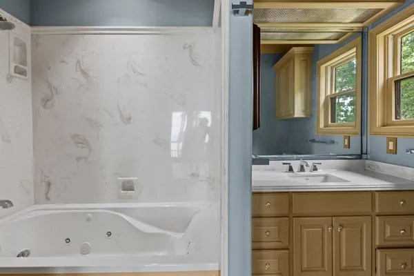 a bathroom with a sink and a bathtub