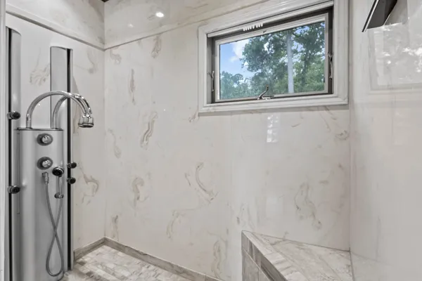 a view of a park with large trees