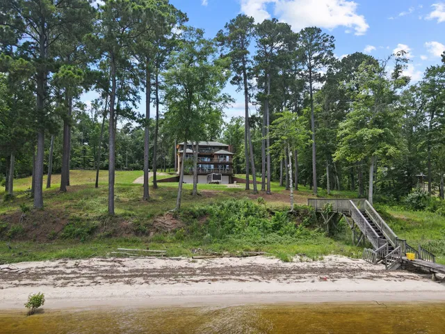 an aerial view of a house with a garden