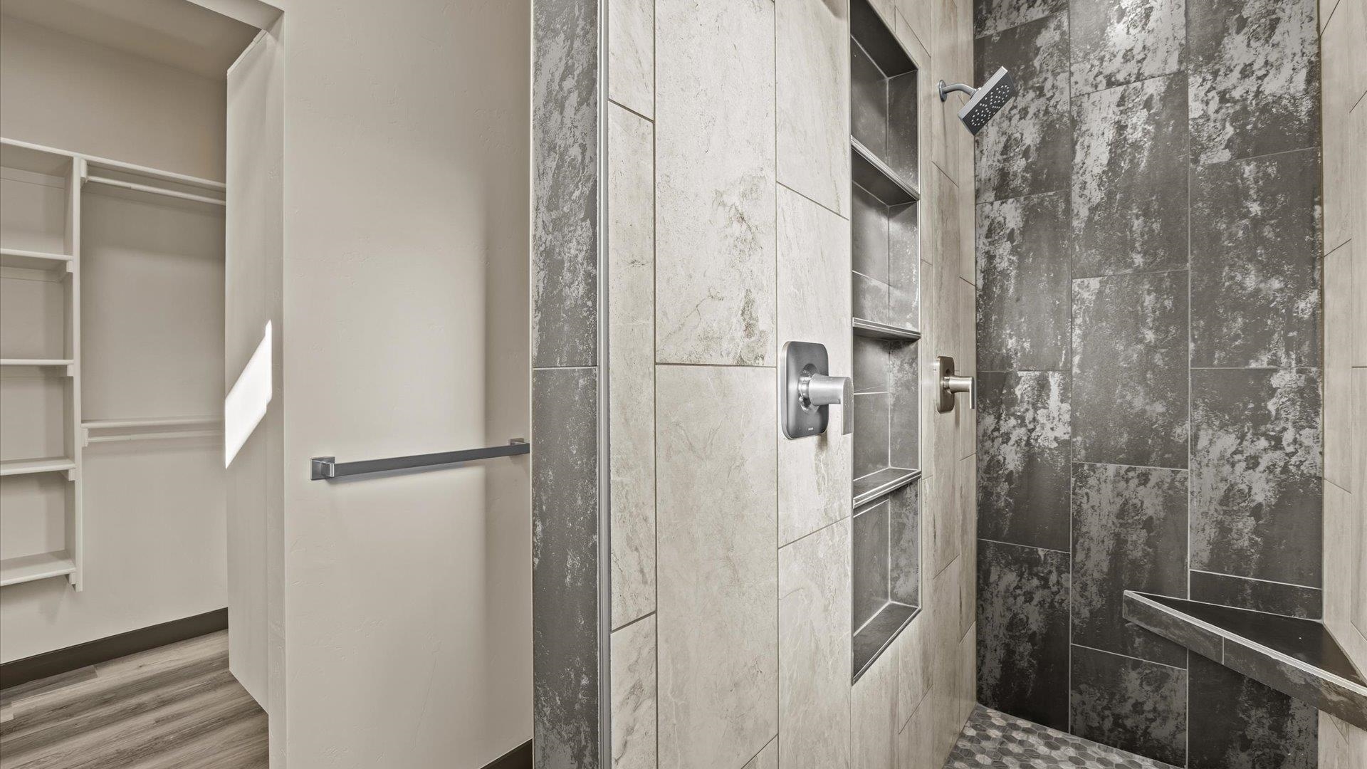 635 Anvil Way Grand Junction, CO 81504 - Photo 19 of 30 a bathroom with a glass shower door