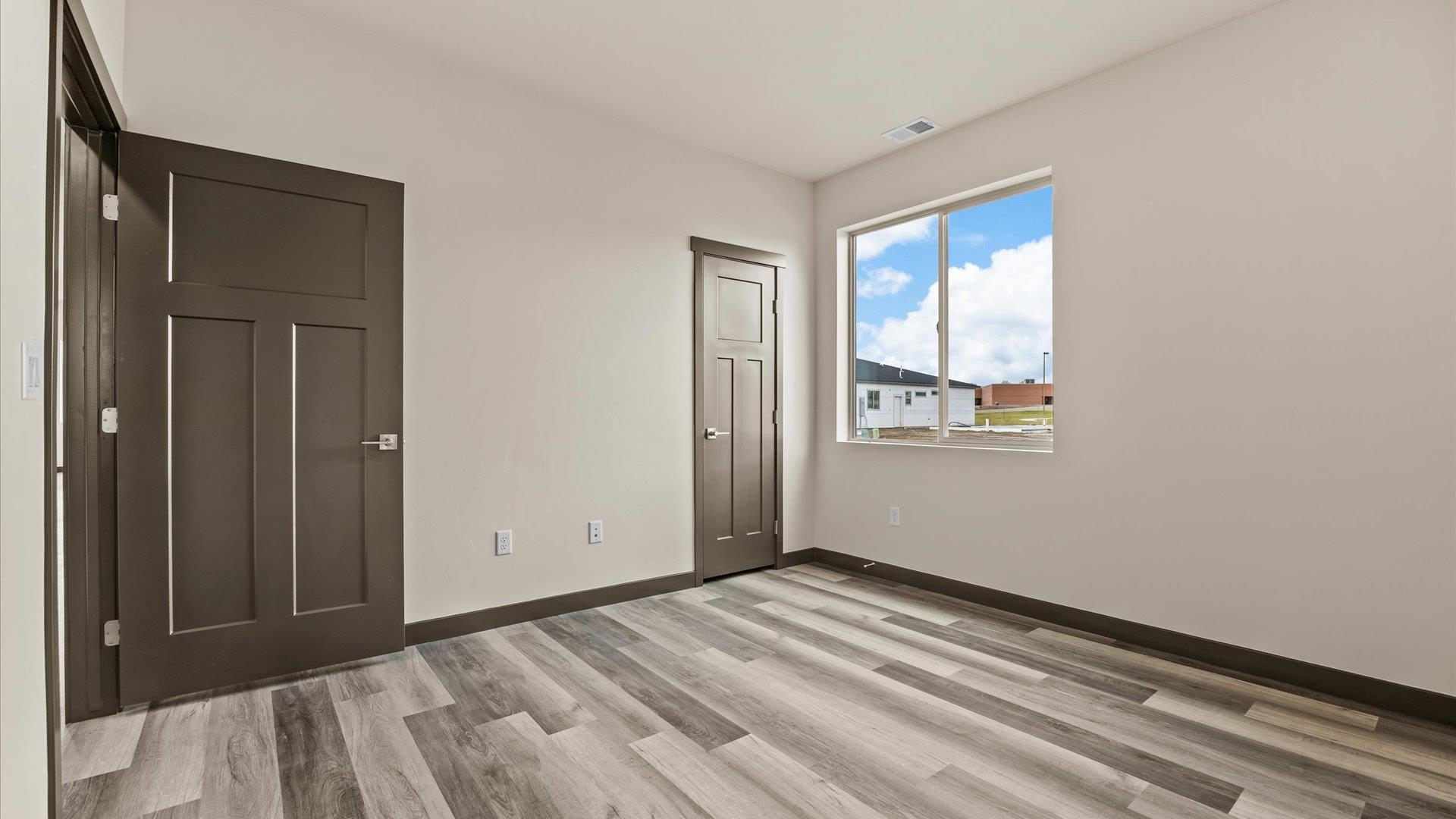 635 Anvil Way Grand Junction, CO 81504 - Photo 21 of 30 a view of empty room with wooden floor