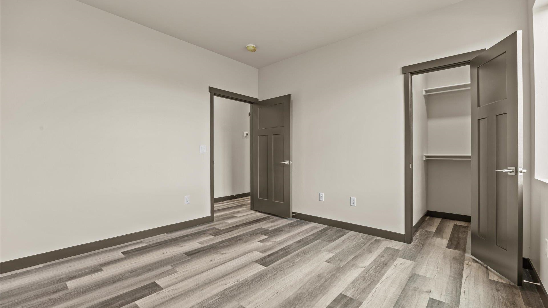 635 Anvil Way Grand Junction, CO 81504 - Photo 22 of 30 a view of a room with wooden floor and closet