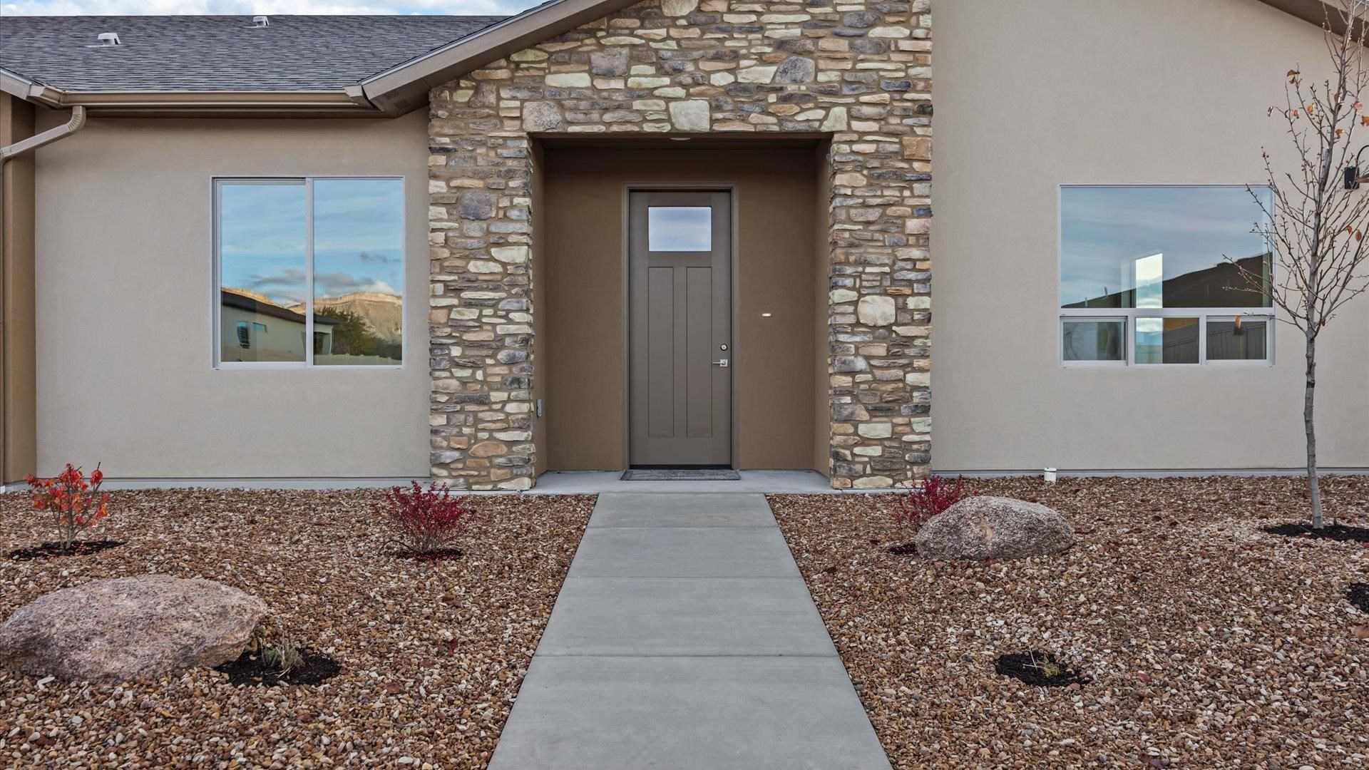 635 Anvil Way Grand Junction, CO 81504 - Photo 7 of 30 a front view of a house