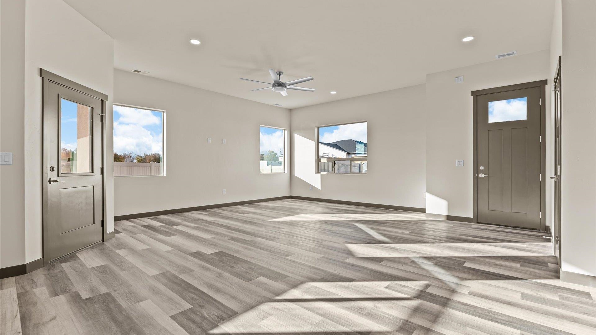 635 Anvil Way Grand Junction, CO 81504 - Photo 9 of 30 a view of an empty room with window and bathroom