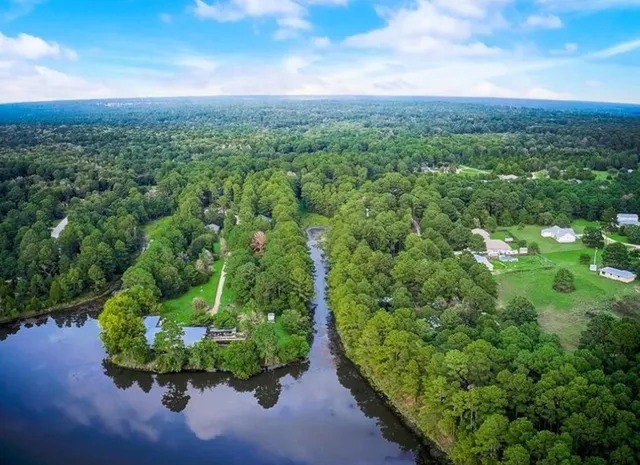 a view of swimming pool with chairs