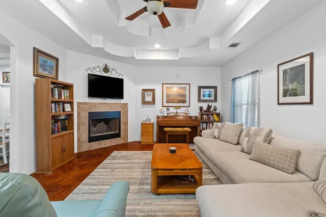 a living room with furniture or fireplace and a flat screen tv