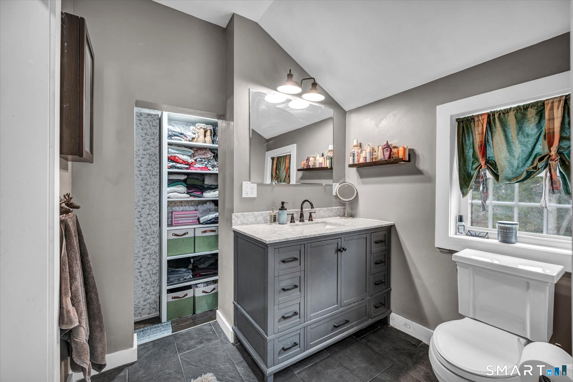 566 Maple Street Litchfield, CT 06759 - Photo 19 of 34 a view of bathroom with a sink and a mirror
