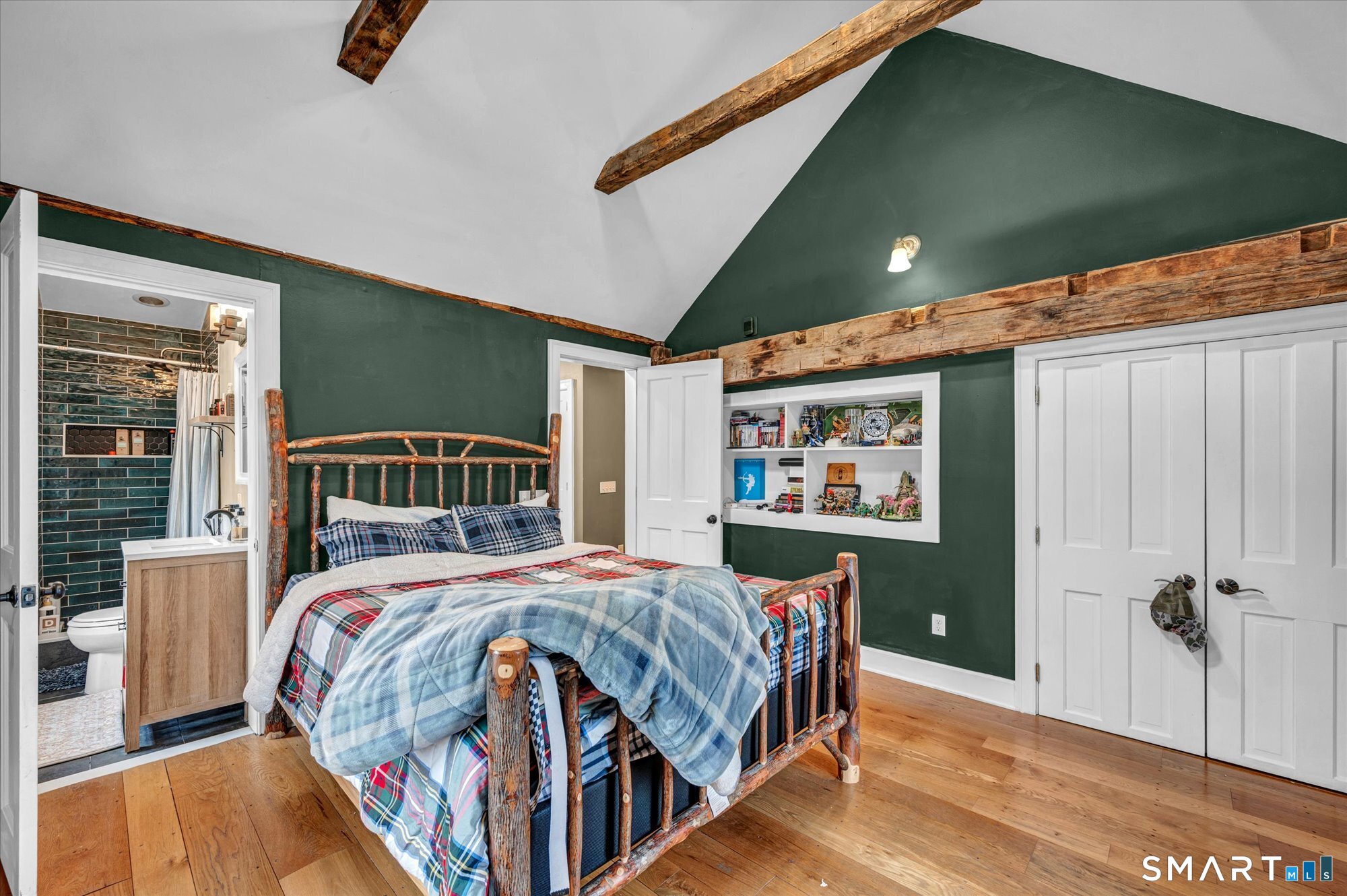 566 Maple Street Litchfield, CT 06759 - Photo 22 of 34 a bedroom with a large bed and a window