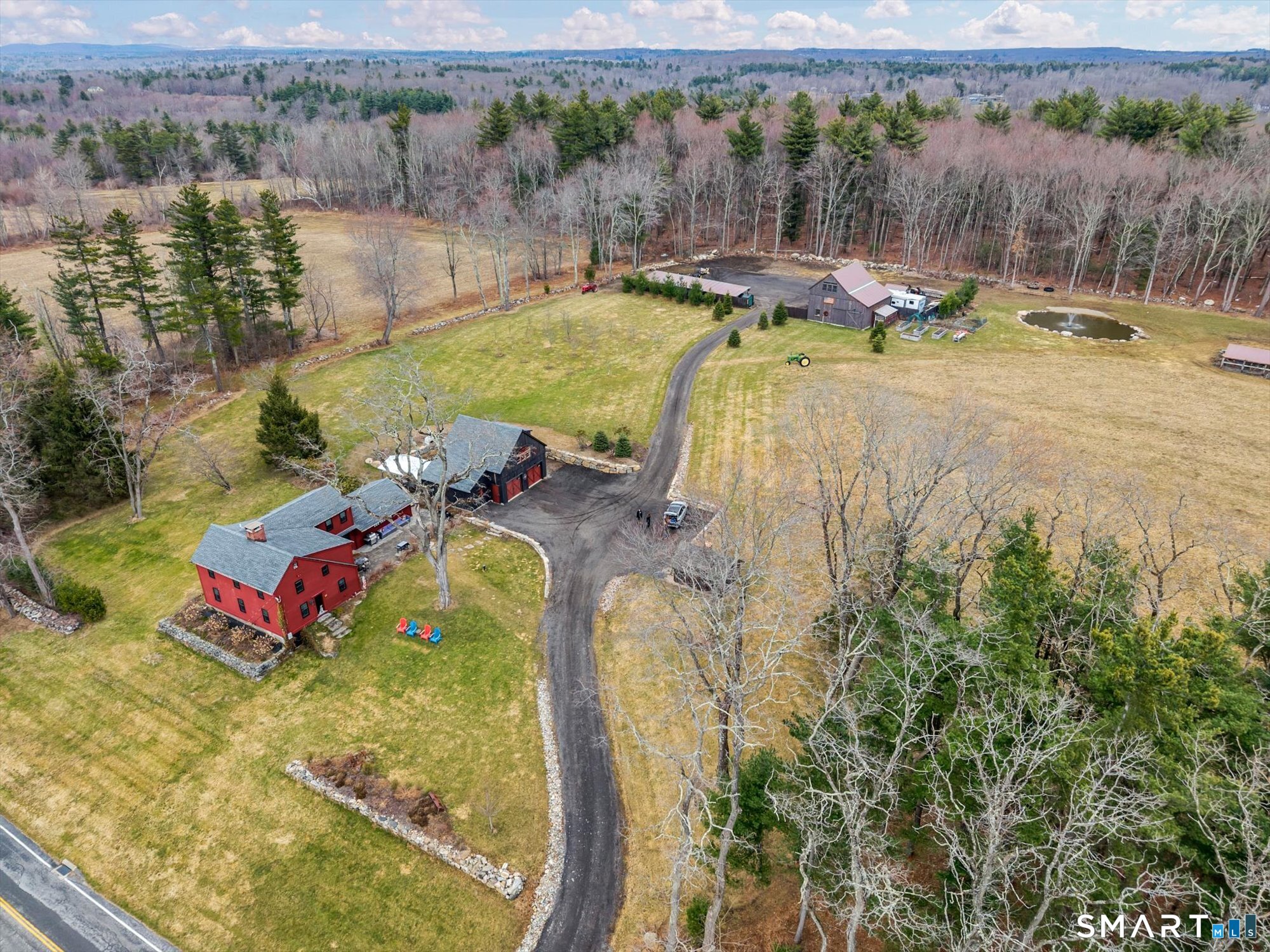 566 Maple Street Litchfield, CT 06759 - Photo 30 of 34 a view of a swimming pool with a yard