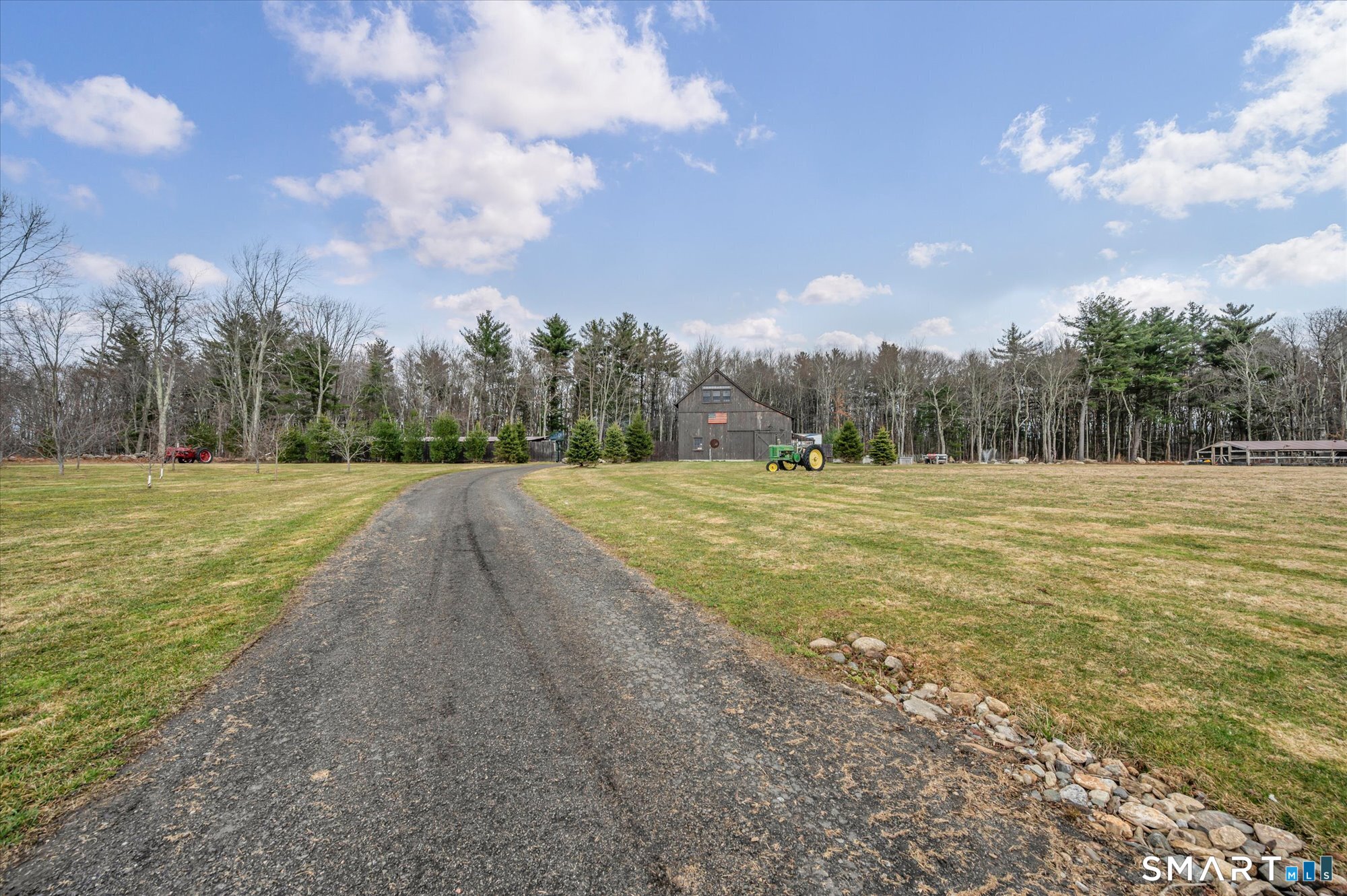 566 Maple Street Litchfield, CT 06759 - Photo 34 of 34 a view of a swimming pool and trees in the background