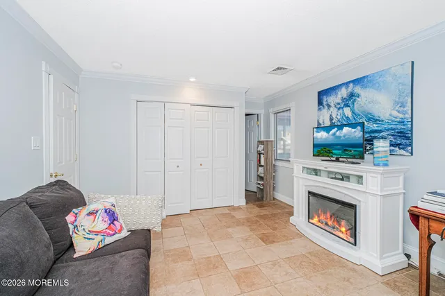 a bathroom with a toilet a sink and shower