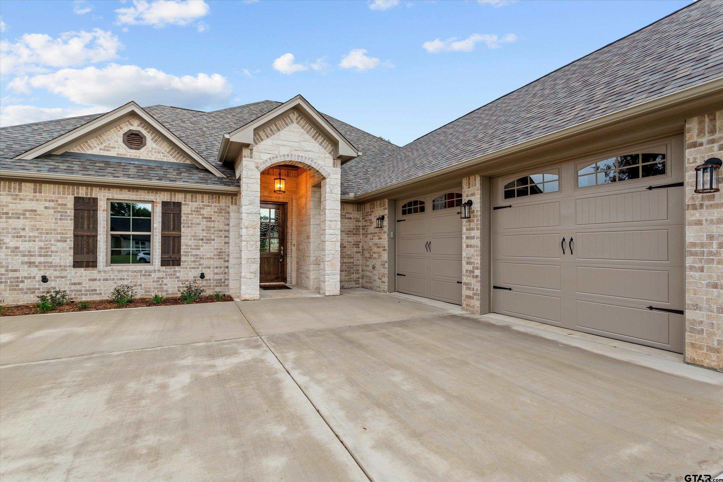 8527 Freestone Drive Bullard, TX 75757 - Photo 2 of 21 a view of a white house with a large windows