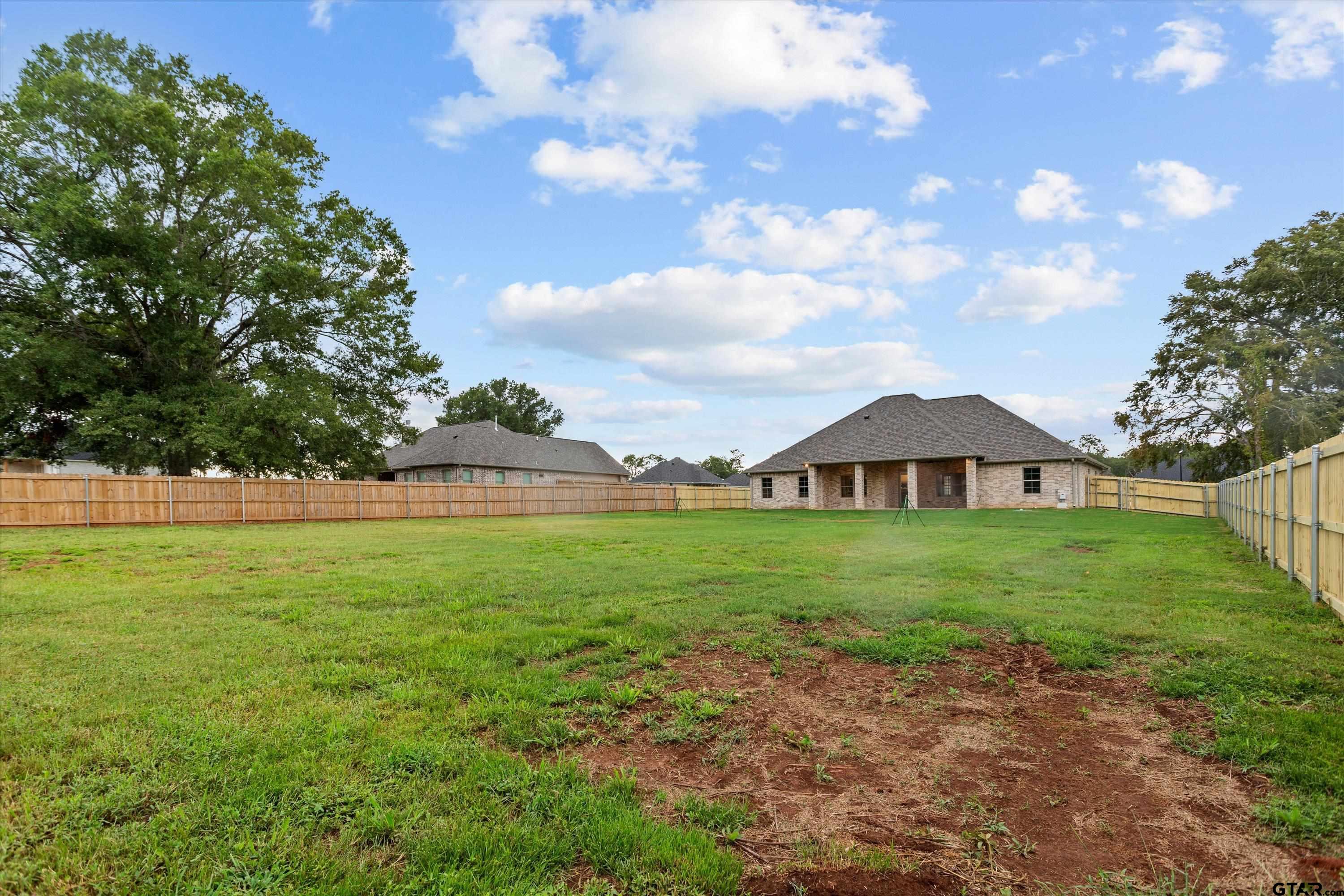 8527 Freestone Drive Bullard, TX 75757 - Photo 5 of 21 a view of a large garden in front of a house