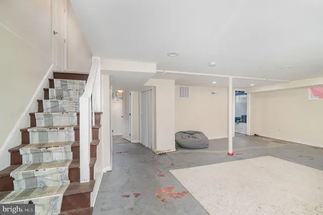 a view of a livingroom with wooden floor