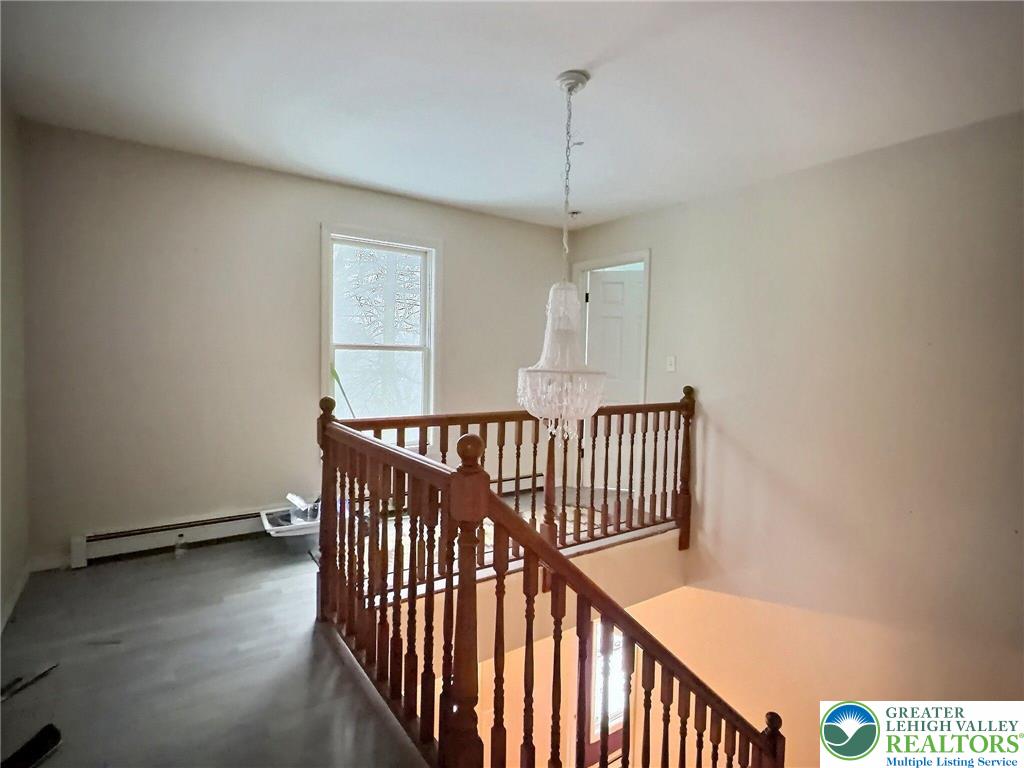 375 Marcel Drive Dingmans Ferry, PA 18328 - Photo 11 of 37 a view of a hallway with stairs