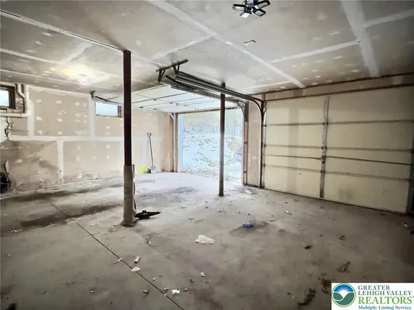 a view of a two chairs in the balcony